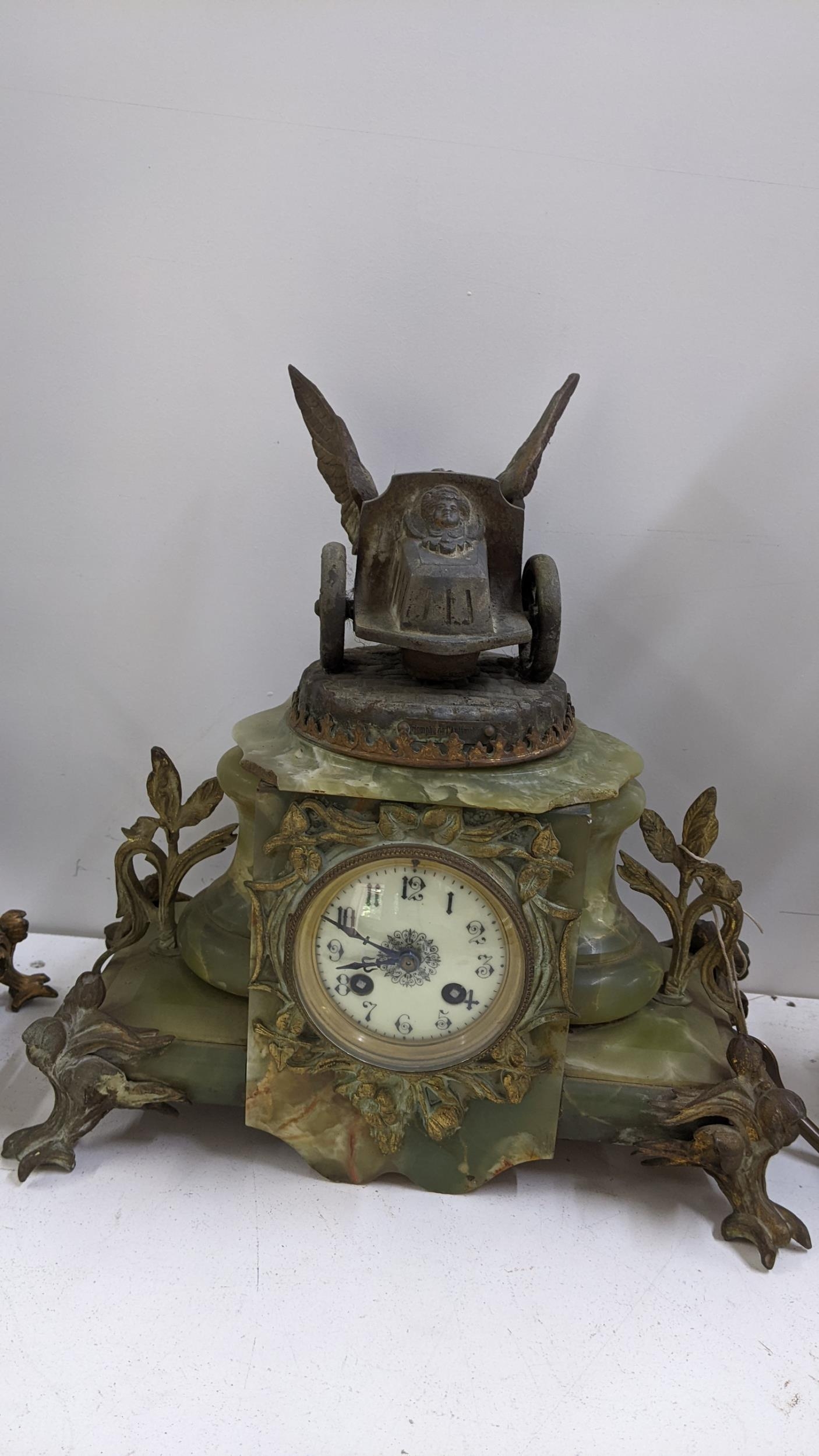 A late 19th century French onyx clock garniture set applied with gilt metal mounts and spelter - Image 2 of 5