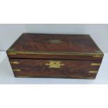 A 19th century mahogany and brass bound campaign writing slope with a fitted interior 18.5cmh x