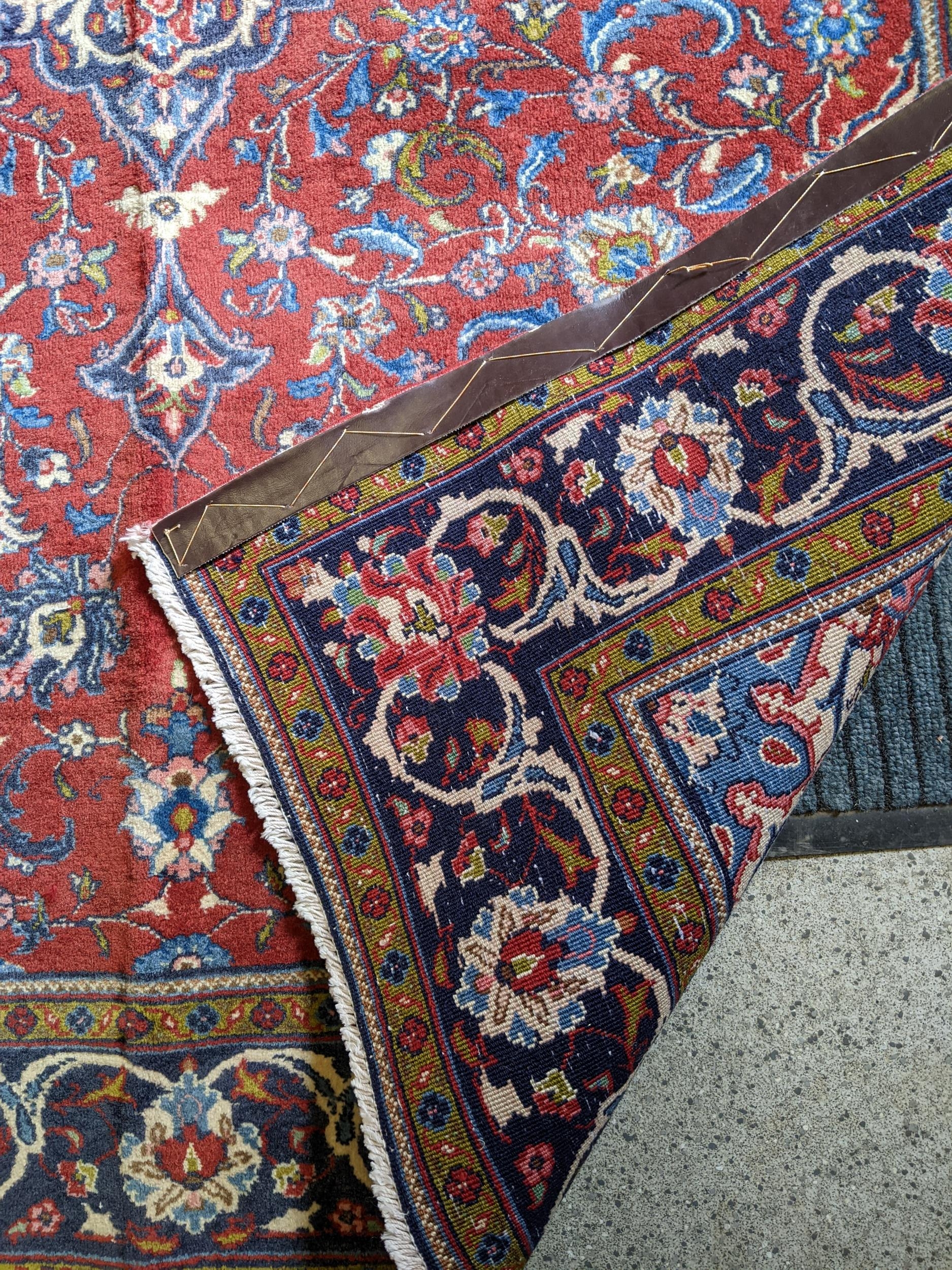 An Isfahan rug with a central medallion on a cream coloured ground 205cm x 131cm Location If there - Image 2 of 3