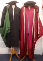 A mid 20th Century W.Northam burgundy university gown and a later Ede & Ravenscroft black university