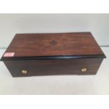 A Victorian rosewood music box having 6 airs. Location: