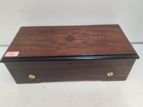 A Victorian rosewood music box having 6 airs. Location: