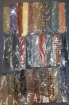 A collection of 32 gents silk ties to include Gucci, YSL, Aquascutum and Pierre Cardin all in
