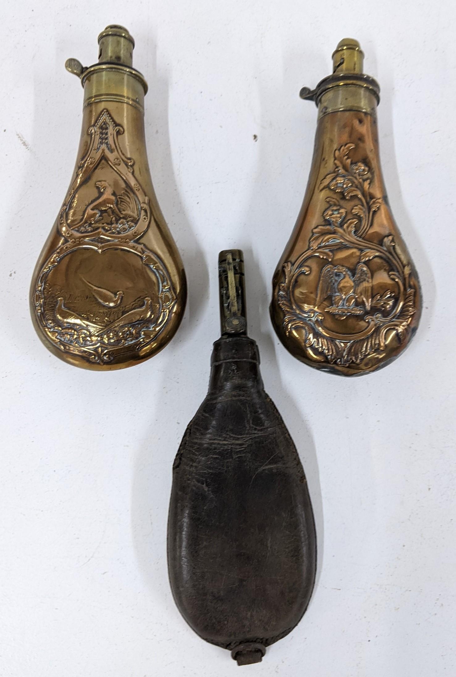 Three antiques powder flasks, two brass and one leather Location: If there is no condition report - Image 2 of 2