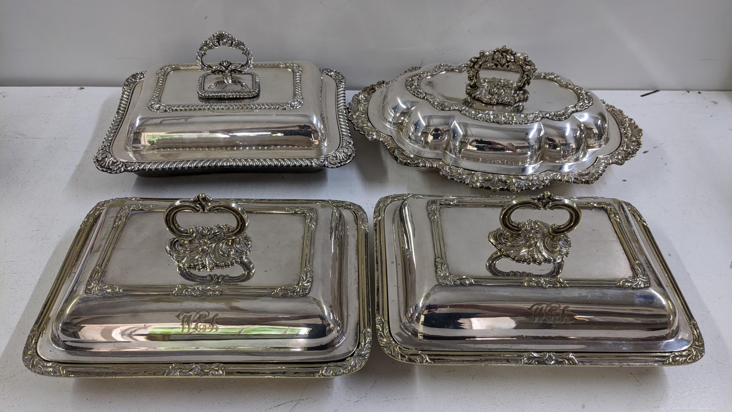 Four silver plated serving tureens to include a matching pair with C scroll handles, engraved with