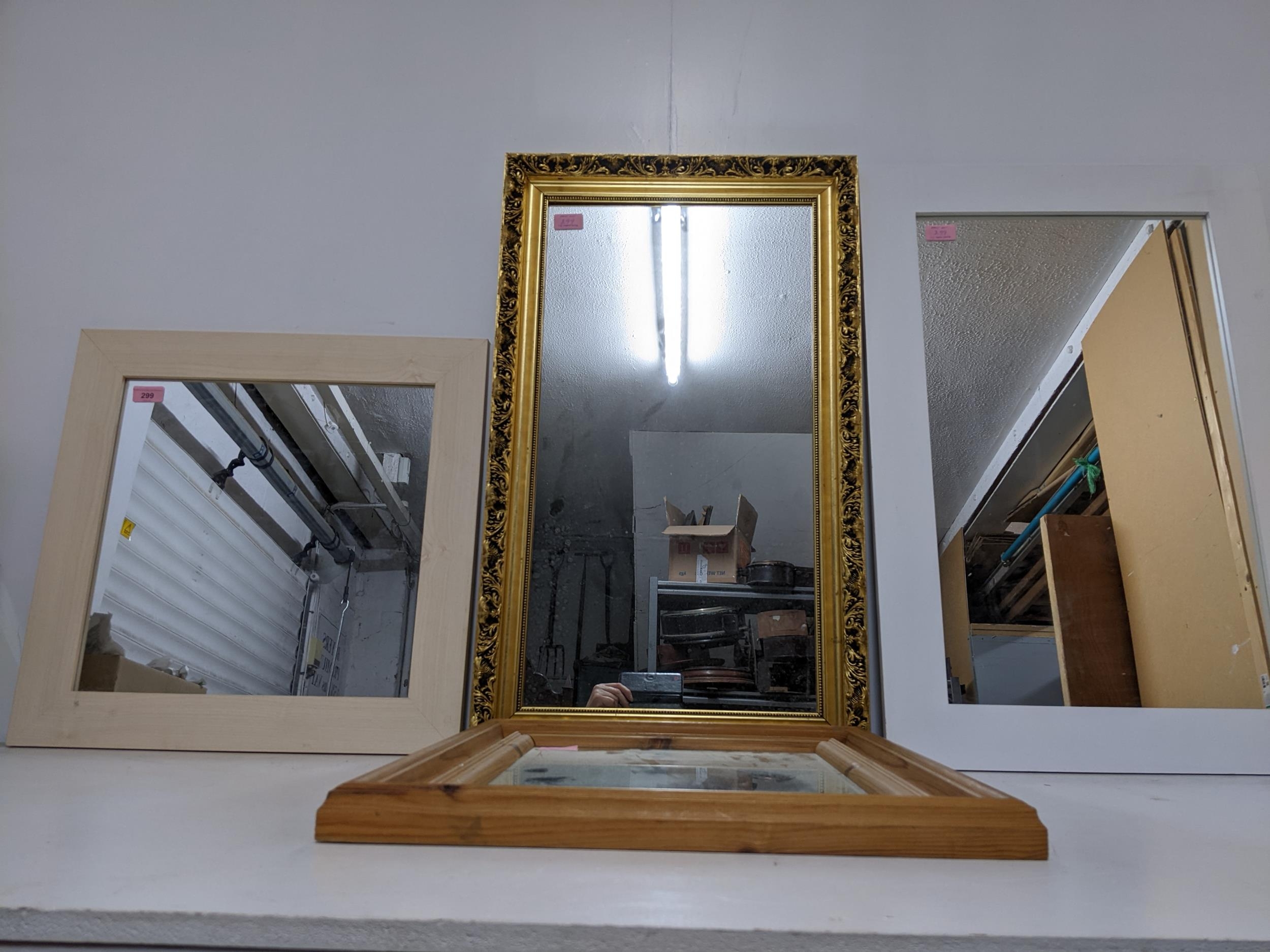 A group of our assorted contemporary wall mirrors to include a gilt framed mirror, a pine framed