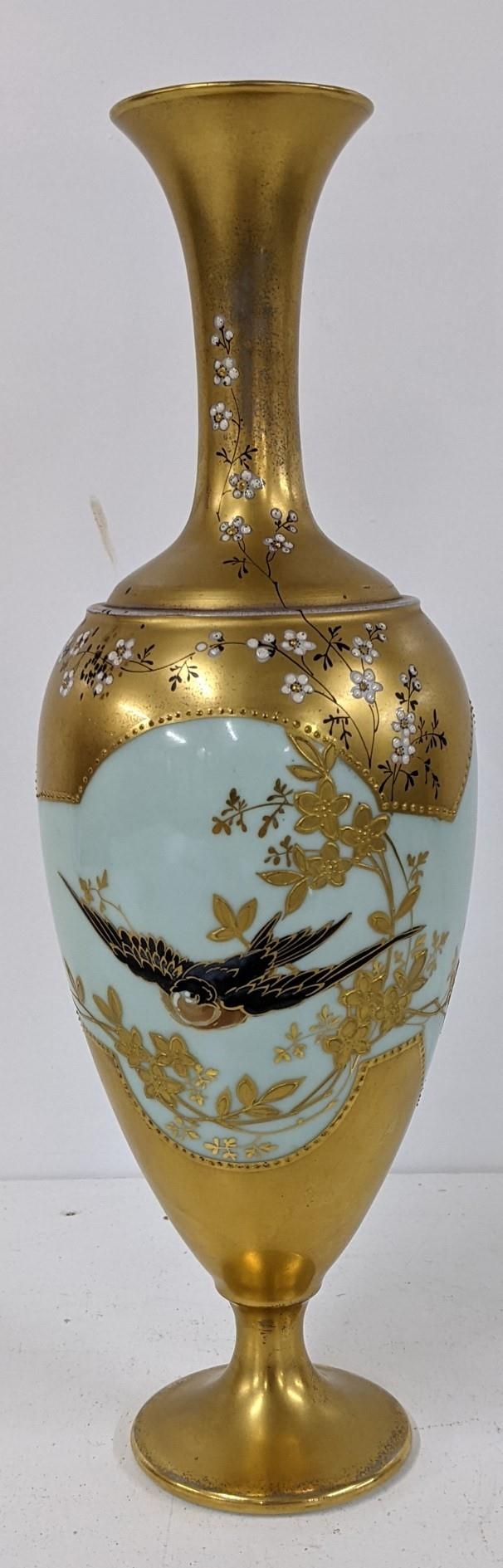 A late 19th/early 20th century Limoges porcelain vase decorated with a bird Location: If there is no