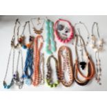A quantity of late 20th Century and modern High Street bead necklaces to include Next and