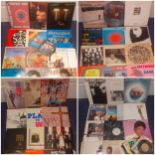 A quantity of mainly 1970's and 1980's LP'S, 12" singles and 45rpm singles to include the rock bands