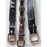 A group of 3 x 1980's belts to include a gold tone and brown snakeskin belt and a Levi black leather