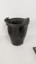 A 19th century leather bound bucket Location: If there is no condition report shown, please request