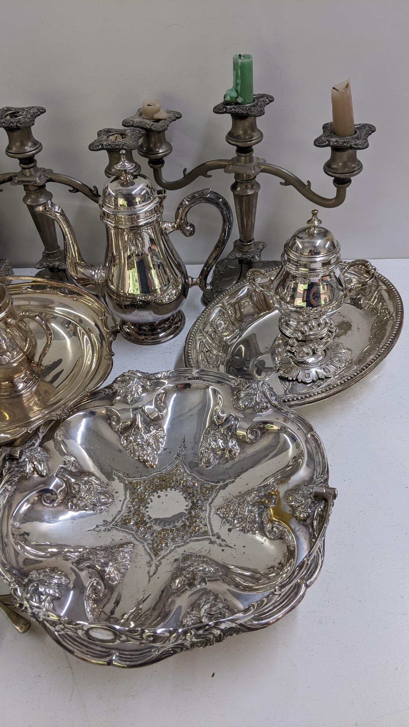 Mixed silver plate to include a tea pot, loose cutlery, embossed basket and other items Location: If - Image 2 of 4