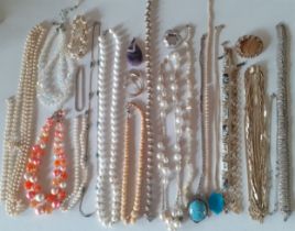 A quantity of costume jewellery to include a simulated pearl necklace with silver clasp and others