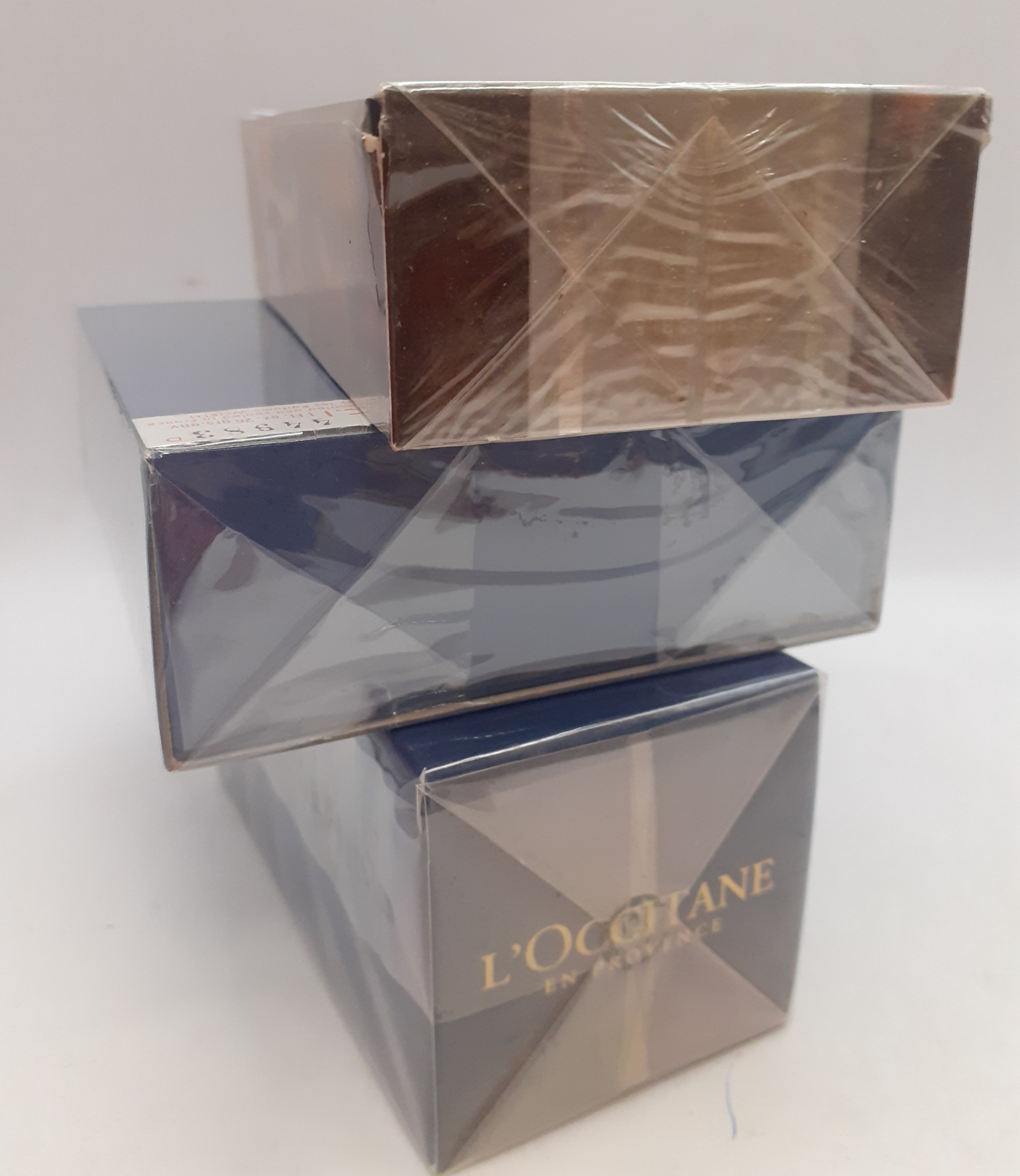 Three sealed fragrances comprising a bottle of L'Occitane Notre Flore Eau de Parfum 75ml, a bottle - Image 2 of 3