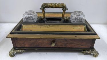 A Regency rosewood and brass bound desk stand with two ink pots and single drawer Location: If there