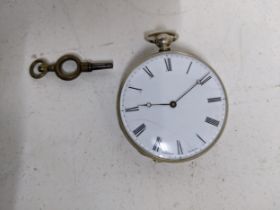 A Swiss white metal and key wound pocket watch, white enamel Roman dial marked Johnson Geneve, the