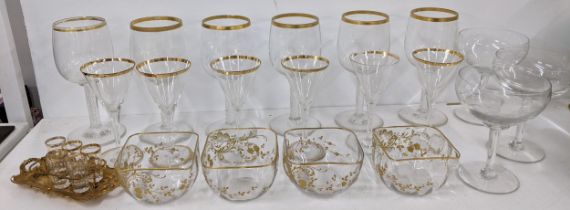 Glassware to include as et of French gold rimmed drinking glasses, bowls and shot glasses in a