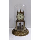 A circa 1900 brass and glass domed case anniversary clock, 30.5cmh Location: If there is no