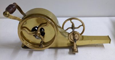 A 19th century brass mechanical fire bellows with turned timber handles Location: 1-1 If there is no