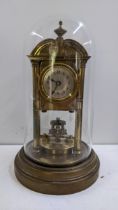An early 20th century Gustav Becker brass and glass domed top anniversary clock 31cmH Location: If
