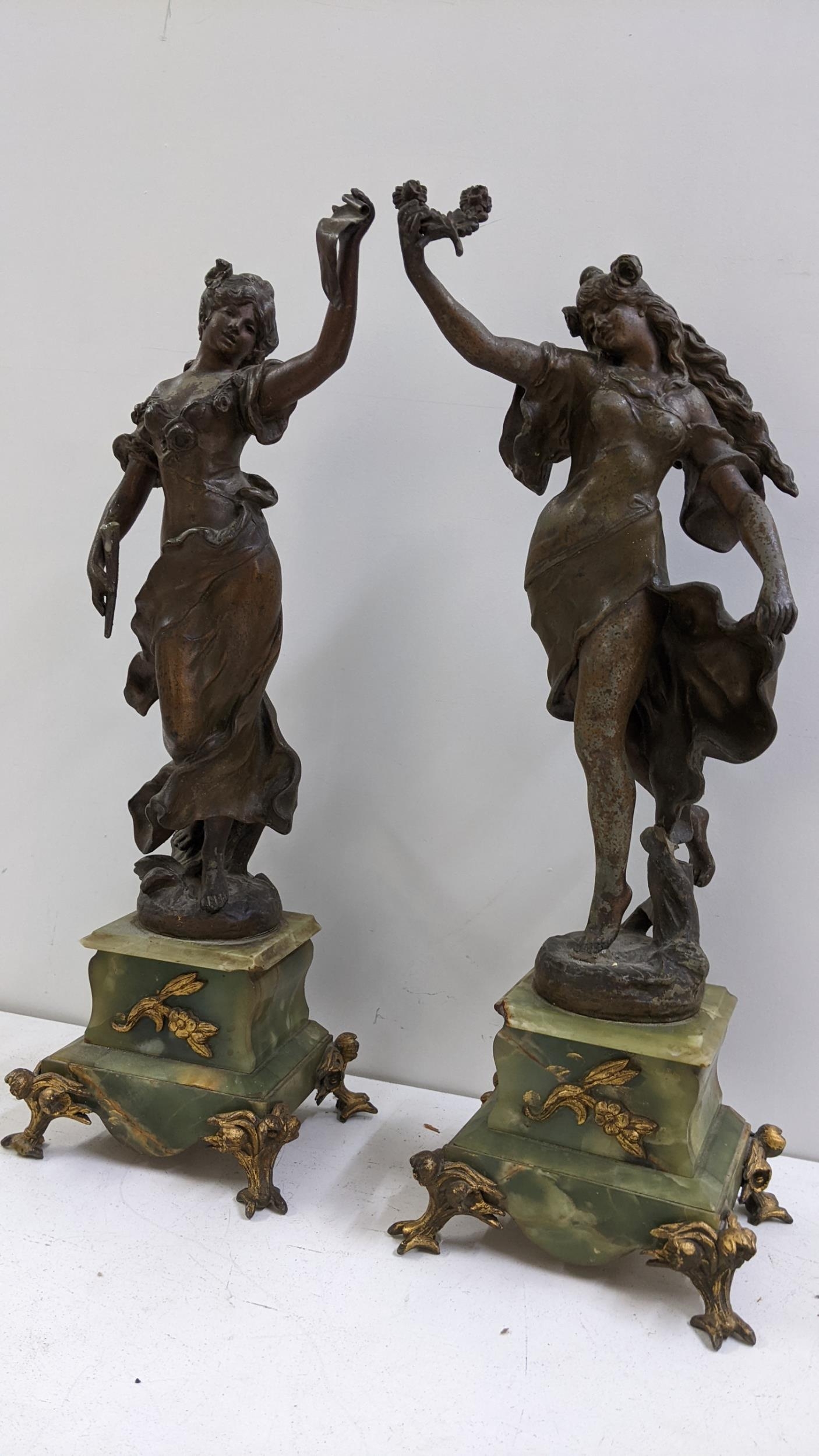 A late 19th century French onyx clock garniture set applied with gilt metal mounts and spelter - Image 5 of 5