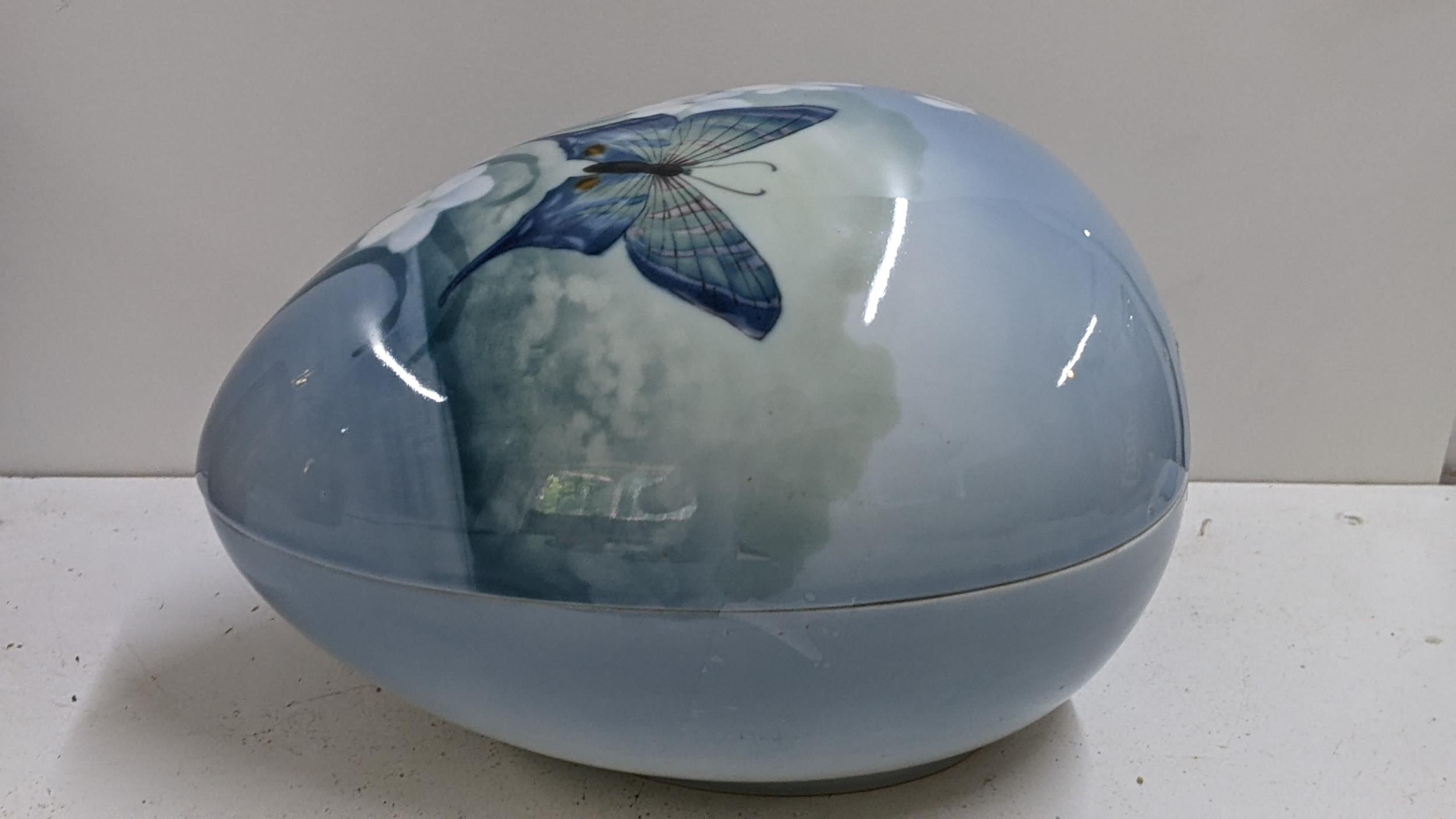 An early/mid 20th century Bernard Block porcelain egg in two sections and painted with a - Image 2 of 3