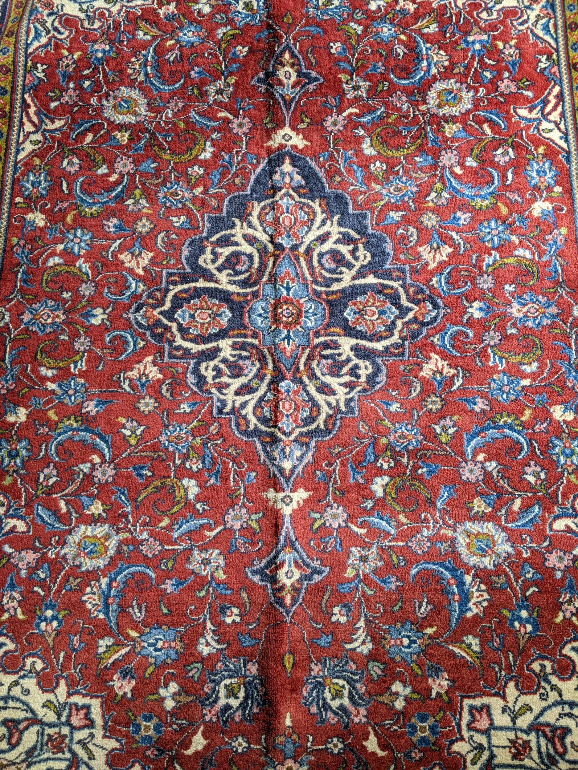 An Isfahan rug with a central medallion on a cream coloured ground 205cm x 131cm Location If there - Image 3 of 3