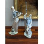 Two Lladro figures to include a woman with two water jugs, and a gentleman with a sword on one