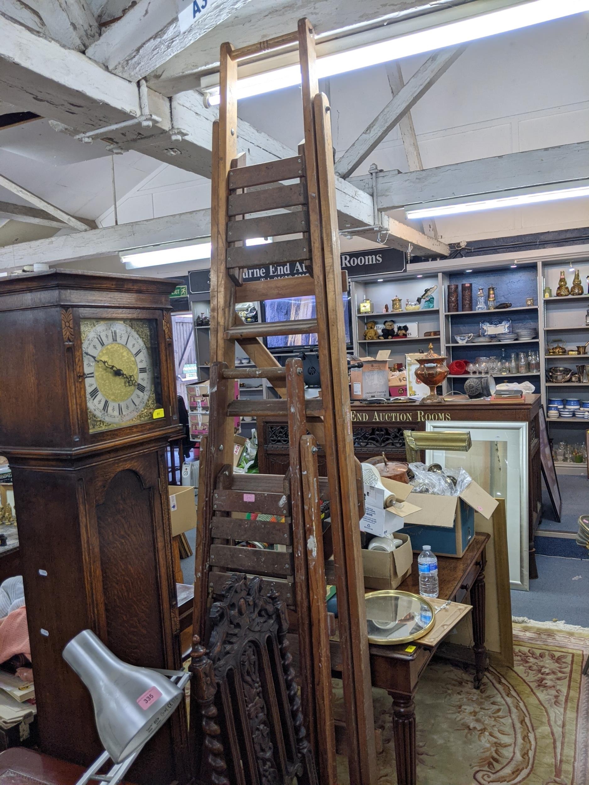 A Slingsby pine folding step ladder, a taller wooden step ladder and a terracotta roof tile