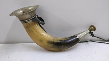 An early 20th century hunting horn with silver plated mounts Location: If there is no condition