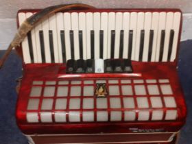 A vintage Parrot accordion in red marbled case, leather straps A/F, no travel case. Location:RAM