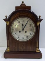 An early 20th century Regency style mahogany 8 day mantle clock with count wheel strike and a single