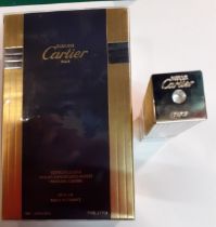 Cartier- A 50ml Must De Cartier Eau de Toilette natural spray in sealed box together with a silver
