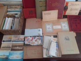 Three vintage partially filled stamp albums and loose stamps, vintage postcards to include steam
