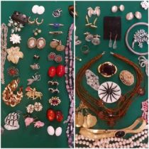 A quantity of vintage costume jewellery to include a pair of 9ct gold earrings with black cabochons,