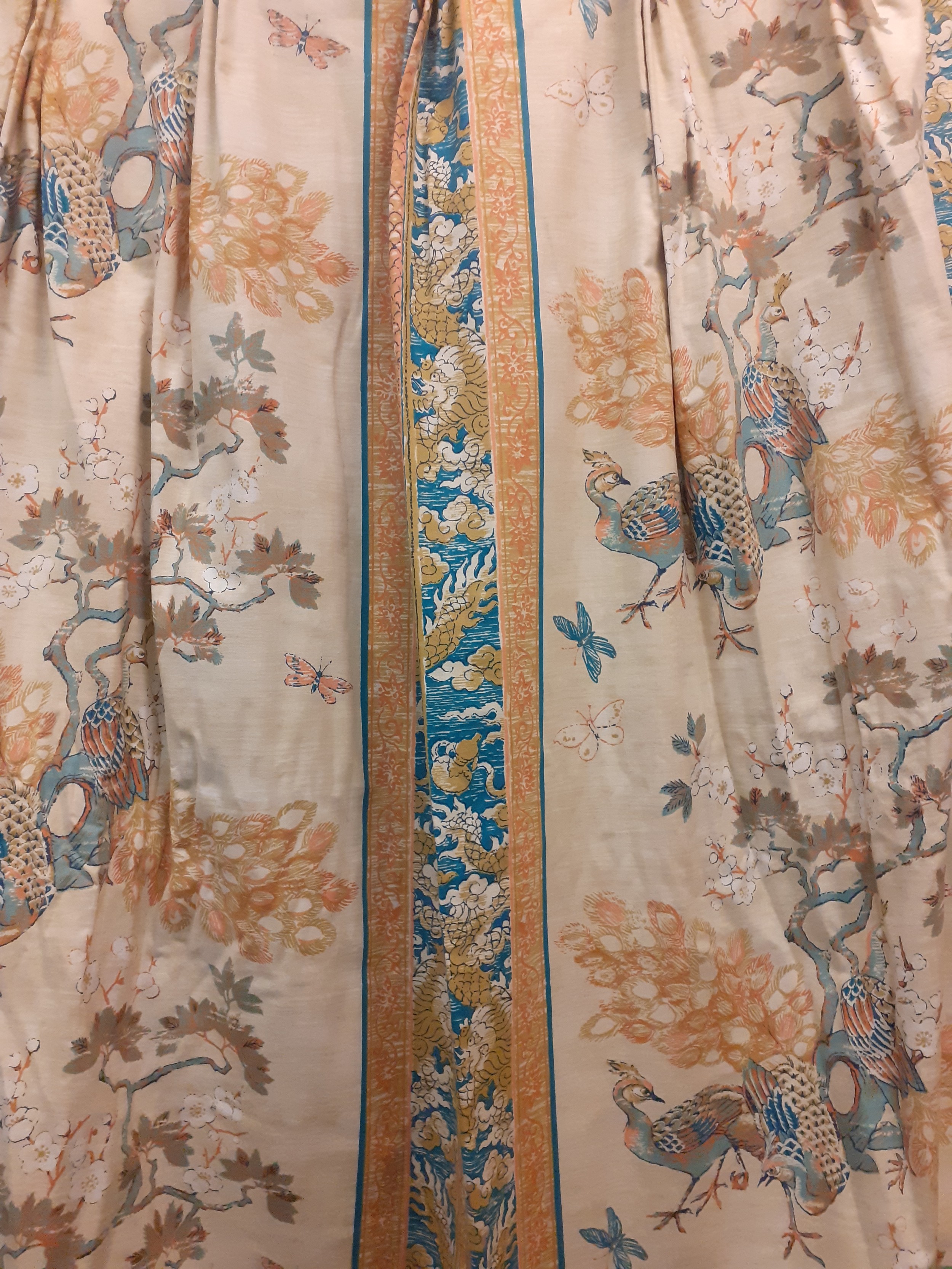 Three pairs of late 20th Century triple pleat curtains having a Oriental theme with images of