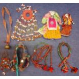 A selection of traditional 20th Century Indian hand embroidered and hand sewn items to include a