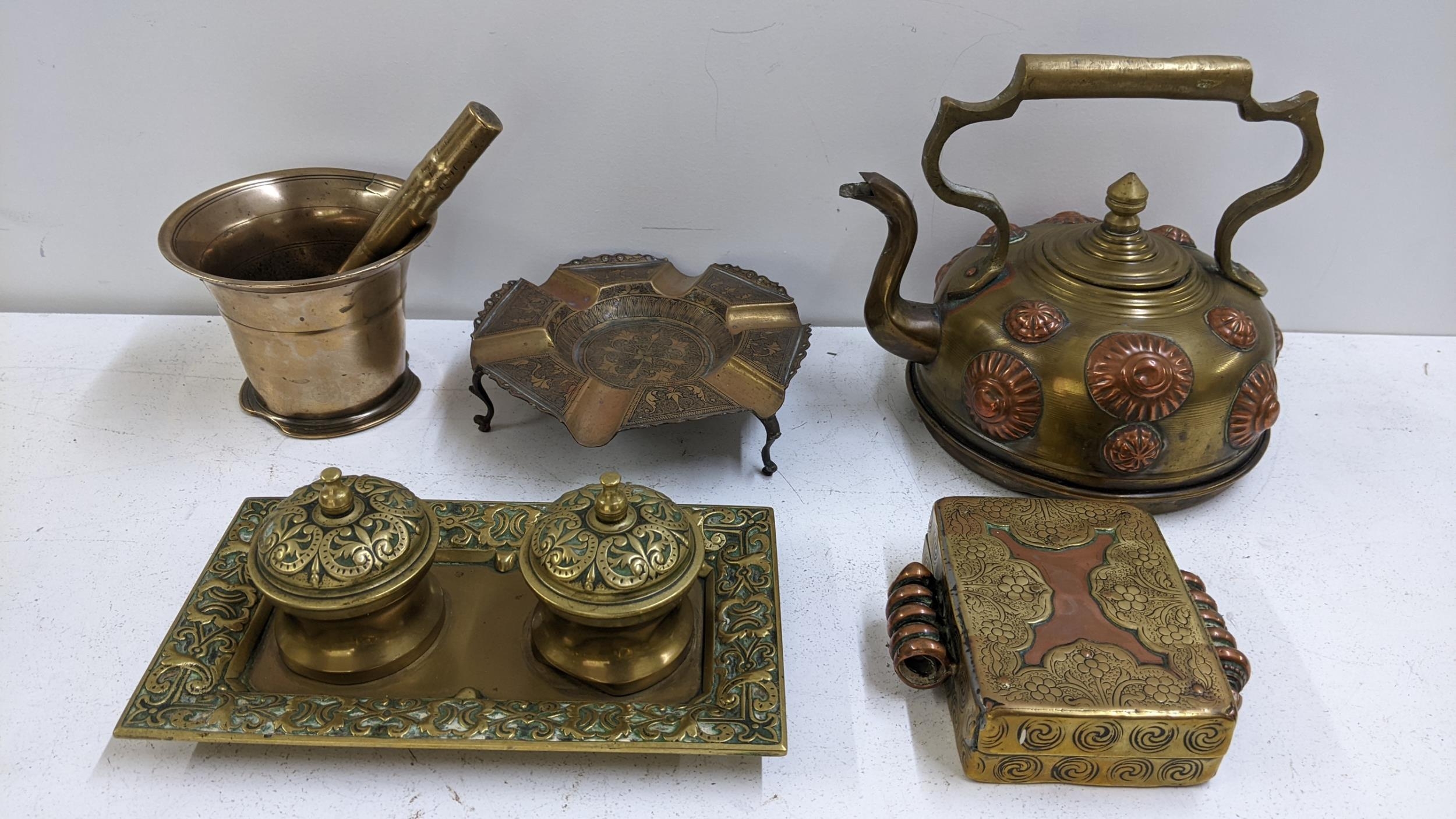 Mixed metalware to include an 18th century bronze pestle and mortar, a Tibetan brass and copper