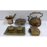 Mixed metalware to include an 18th century bronze pestle and mortar, a Tibetan brass and copper