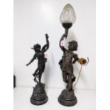 After Moreau - a French 19th century patinated spelter figural table lamp of a young boy scantily