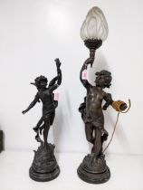 After Moreau - a French 19th century patinated spelter figural table lamp of a young boy scantily