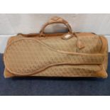 Gucci-A 1960's brown canvas and leather tennis bag A/F in a rare Gucci logo having a luggage