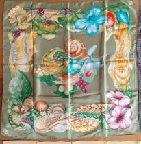 Gucci-A vintage Gucci silk scarf depicting images of a vegetable garden, game and insects on a green