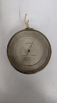 A circular brass cased compensated barometer by Negretti and Zambra London No.10573 Location: If