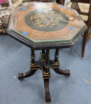 A late Victorian aesthetic marquetry inlaid walnut and ebonized octagonal topped occasional table,