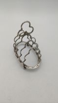 A silver toast rack hallmarked Birmingham 1894, 58.3g Location: If there is no condition report