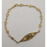 A 18ct gold ladies bracelet set with a blue coloured stone 5.2g Location: If there is no condition