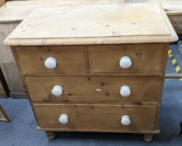 A Victorian small pine chest of two short and two long drawers 84cm h x 85cm w Location: If there is