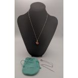 A Tiffany silver and enamelled lady bird pendant and two necklaces total weight 8.6g Location: If