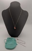 A Tiffany silver and enamelled lady bird pendant and two necklaces total weight 8.6g Location: If